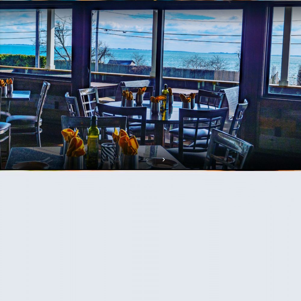 Edgewater Restaurant and Bar with indoor and outdoor waterfront dining near Ocean View Terrace Inn, Hampton Bays