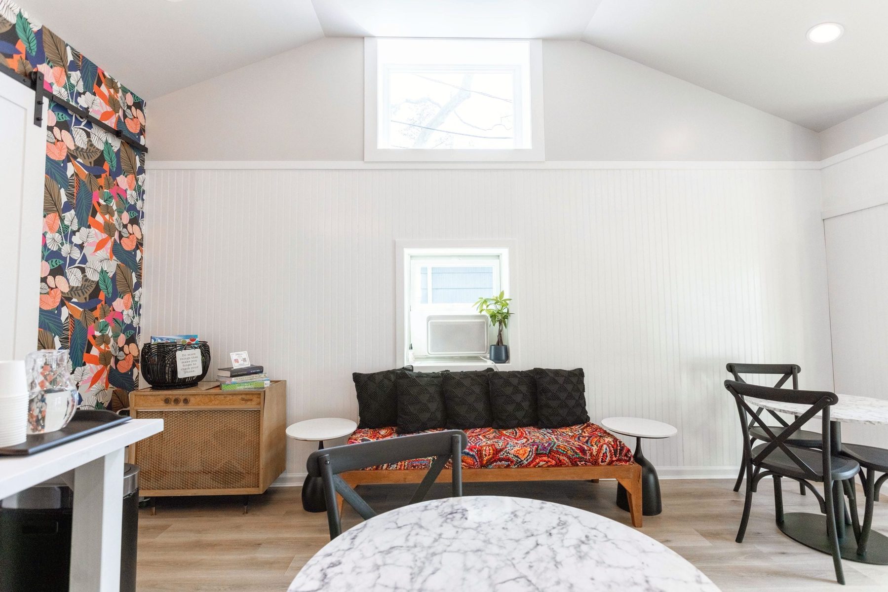 Social Den outdoor seating area at Ocean View Terrace Inn overlooking the grounds
