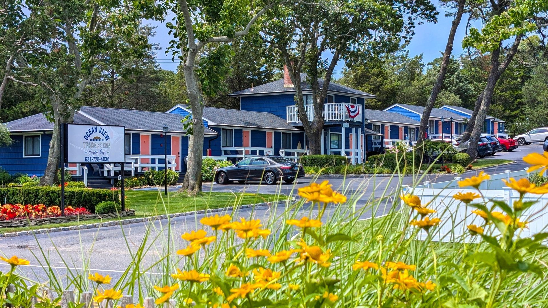 Ocean View Terrace Inn entrance and grounds at 285 E Montauk Hwy, Hampton Bays, NY